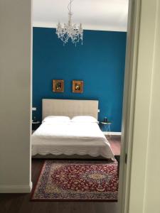 Voodi või voodid majutusasutuse Ortigia Twin Rooms toas