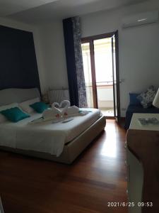 Postel nebo postele na pokoji v ubytování B&B Tiffany