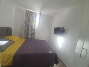Postel nebo postele na pokoji v ubytování AmAmA