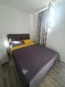 Postel nebo postele na pokoji v ubytování AmAmA