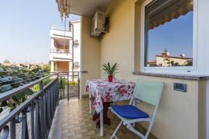 Ein Balkon oder eine Terrasse in der Unterkunft Apartments Maria