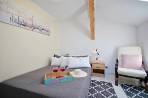 Łóżko lub łóżka w pokoju w obiekcie Plaża Apartament