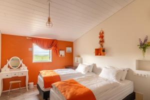 Cama o camas de una habitación en Arnarnes Paradise