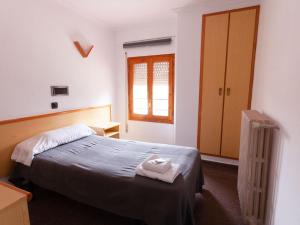 Postel nebo postele na pokoji v ubytování Hostal Gabás