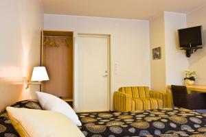 TV a/nebo společenská místnost v ubytování Art Hotell + 11 fotografií