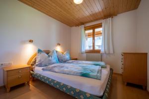 Posteľ alebo postele v izbe v ubytovaní Ferienbauernhof Oberhauser