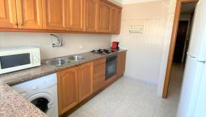 Kuchyňa alebo kuchynka v ubytovaní Apartaments Club Nautic L'Escala