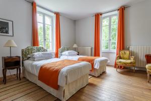 سرير أو أسرّة في غرفة في Villa Maris