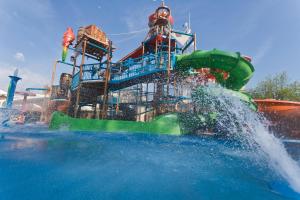 a water slide in the water at a water park at EurothermenResort Bad Schallerbach - Hotel Paradiso Superior in Bad Schallerbach