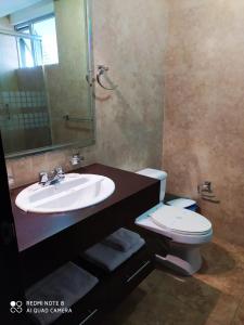 Koupelna v ubytování Misuitehotel La Carolina Quito