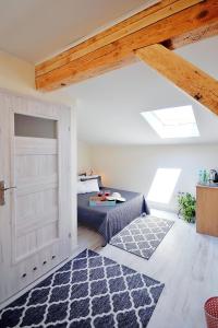 Łóżko lub łóżka w pokoju w obiekcie Plaża Apartament