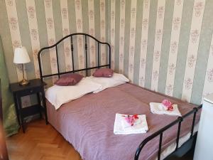 Posteľ alebo postele v izbe v ubytovaní Vila Janáčkova - 1st republic villa