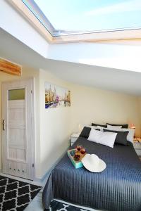 Łóżko lub łóżka w pokoju w obiekcie Plaża Apartament