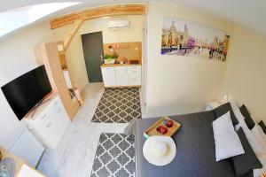 Telewizja i/lub zestaw kina domowego w obiekcie Plaża Apartament