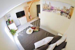 Łóżko lub łóżka w pokoju w obiekcie Plaża Apartament