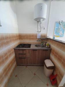 Kuchyň nebo kuchyňský kout v ubytování Apartmani Pucarin