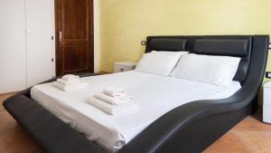 Postel nebo postele na pokoji v ubytování Casa Luisa - Pan di Zucchero - Nebida