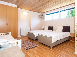 Postel nebo postele na pokoji v ubytování Holiday home Aars