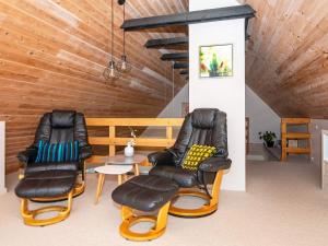 A seating area at Holiday home Aars