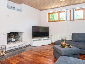 TV a/nebo společenská místnost v ubytování Holiday home Aars + 25 fotografií