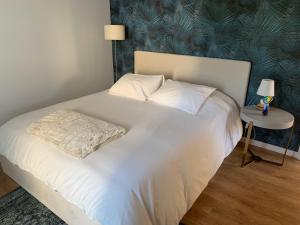 Katil atau katil-katil dalam bilik di A Casa do Abílio em Alvarenga