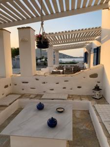 Posedenie v ubytovaní Naoussa Hotel Paros by Booking Kottas