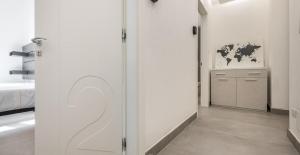 A bed or beds in a room at Ichnusa Rooms
