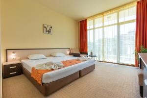 Postel nebo postele na pokoji v ubytování Hotel Julia + 37 fotografií