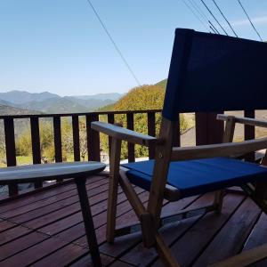 a blue chair sitting on top of a deck at Hatago Masara - Vacation STAY 30108v in Tanabe