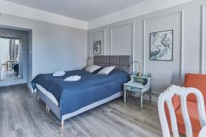Łóżko lub łóżka w pokoju w obiekcie Apartamenty Świnoujście - Armii Krajowej 11