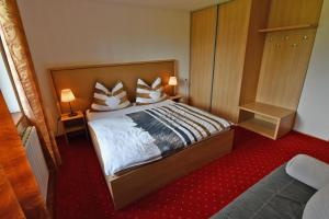 Ein Bett oder Betten in einem Zimmer der Unterkunft VIP Apartmany Besenova