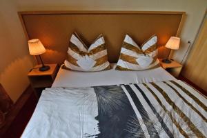 Ein Bett oder Betten in einem Zimmer der Unterkunft VIP Apartmany Besenova