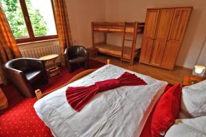 Ein Bett oder Betten in einem Zimmer der Unterkunft VIP Apartmany Besenova