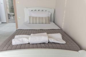 Posteľ alebo postele v izbe v ubytovaní Fotini Apartments
