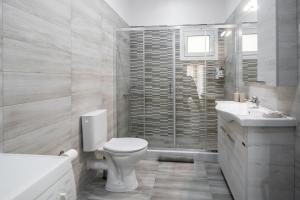 Kúpeľňa v ubytovaní Fotini Apartments