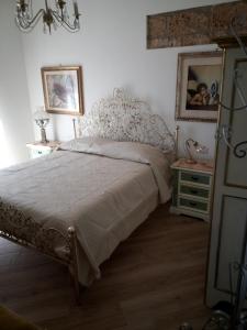 En eller flere senge i et værelse på ASFODELIA-CORALLO