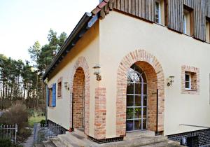 a building with two arches on the side of it at PotsdamApart in Potsdam