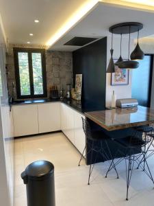 Кухня или мини-кухня в Appartement Villa Cassis
