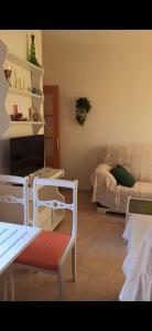 A kitchen or kitchenette at Ático Roquetas