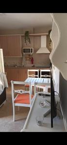 A bed or beds in a room at Ático Roquetas