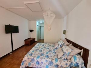 Cama o camas de una habitación en Studio Résidence Tobago
