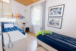 Postel nebo postele na pokoji v ubytování Residence Peček