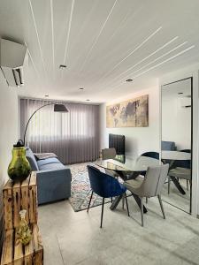 a living room with a couch and a table at Smp BLING BLING in Toulon