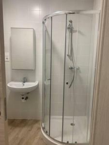 Kúpeľňa v ubytovaní Apartamentos OLIVA + 7 fotografií