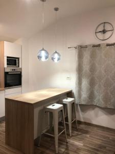 Kuchyň nebo kuchyňský kout v ubytování Ideal Holiday Apartment 2