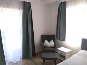 Postel nebo postele na pokoji v ubytování Gästewohnung Schlossblick