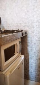 Η κουζίνα ή μικρή κουζίνα στο Kitnet na Rua Sapucai +4 φωτογραφίες