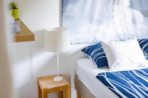 Postel nebo postele na pokoji v ubytování Residence Peček