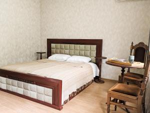 Postel nebo postele na pokoji v ubytování KUTAISI-Maemani