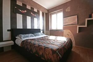 Postel nebo postele na pokoji v ubytování Albachiara home - vista mare